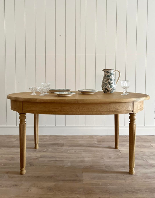 Table ovale à rallonges en chêne