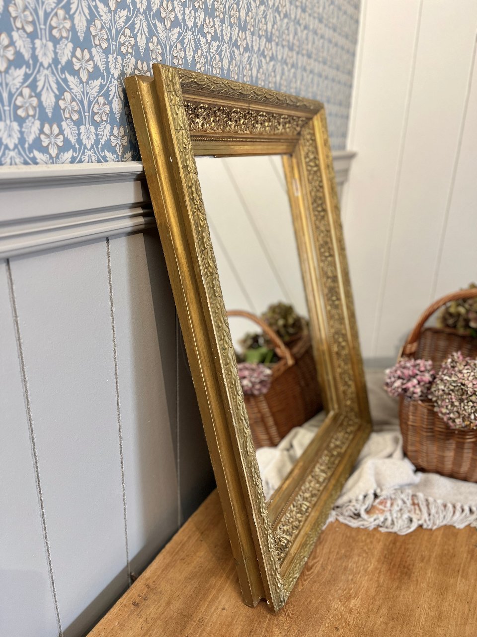Grand miroir ancien doré