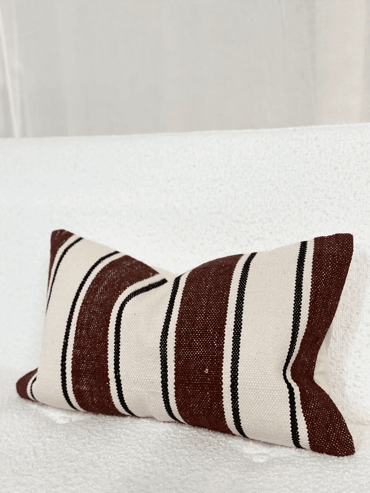 Housse de coussin en coton à rayures brique et noir